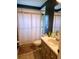 Compact bathroom featuring a shower/tub, vanity, and tiled floors at 5365 Sw 111Th Lane Rd, Ocala, FL 34476