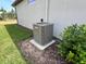 Exterior view of the home's AC unit at 5785 Sw 87Th Court Rd, Ocala, FL 34481