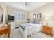 Well-lit bedroom with a window, and a soothing color palette at 6882 Sw 113Th Pl, Ocala, FL 34476