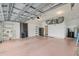 Spacious garage with functional shelves and storage space at 6882 Sw 113Th Pl, Ocala, FL 34476