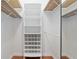 Walk-in closet features custom shelving and storage solutions at 6882 Sw 113Th Pl, Ocala, FL 34476
