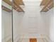 Spacious walk-in closet with shelving and hanging space for optimal organization at 6882 Sw 113Th Pl, Ocala, FL 34476
