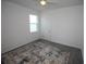 Neutral bedroom features a window providing natural light and carpet flooring at 7429 Sw 61St St, Ocala, FL 34474