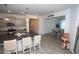 Open concept with a kitchen island and adjacent dining area at 7429 Sw 61St St, Ocala, FL 34474