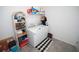 Functional laundry room with modern appliances, stylish decor, and ample storage space at 7429 Sw 61St St, Ocala, FL 34474