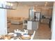 Open-concept living space with a kitchen island, dining area, and comfortable seating at 7429 Sw 61St St, Ocala, FL 34474