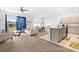 View of an open concept living space showcasing the Gathering room, dining area and kitchen at 7571 Sw 64Th Street Rd, Ocala, FL 34474