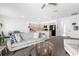 Open-concept living space features a living room and kitchen with an island at 7571 Sw 64Th Street Rd, Ocala, FL 34474