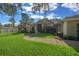 Beautiful single-story home with a lush front yard, mature landscaping, and inviting walkway leading to the front door at 811 Se 49Th Ave, Ocala, FL 34471