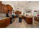 Open kitchen with stainless steel appliances, granite countertops and custom cabinets at 811 Se 49Th Ave, Ocala, FL 34471