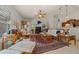 Bright living room with comfortable seating, stylish decor, and plenty of natural light at 811 Se 49Th Ave, Ocala, FL 34471