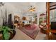 Inviting living room featuring a ceiling fan, and an open floor plan leading to the kitchen and dining area at 811 Se 49Th Ave, Ocala, FL 34471