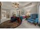The main bedroom features a tray ceiling, a ceiling fan, and carpeted floors with decoratively patterned rug at 811 Se 49Th Ave, Ocala, FL 34471