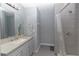 Bathroom featuring a vanity, sink, and shower at 838 Nw 124Th Street, Citra, FL 32113