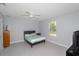 Spacious bedroom with ceiling fan, neutral walls, and tiled floor at 838 Nw 124Th Street, Citra, FL 32113