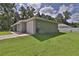 Well-maintained single-story home, featuring an attached one-car garage and lush, green lawn at 838 Nw 124Th Street, Citra, FL 32113