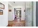 A welcoming foyer with hardwood floors and an ornate glass front door at 8693 Sw 76Th Ln, Ocala, FL 34481