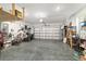 Spacious garage with epoxy floors and storage for multiple bikes and tools at 8693 Sw 76Th Ln, Ocala, FL 34481