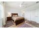 The main bedroom is complete with a dresser, window views, and easy access to an en suite bathroom at 8693 Sw 76Th Ln, Ocala, FL 34481