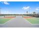 Exterior view of the community pickleball courts featuring professional court surface and tall fencing at 8693 Sw 76Th Ln, Ocala, FL 34481