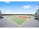 Exterior view of the community pickleball courts featuring professional court surface and tall fencing at 8693 Sw 76Th Ln, Ocala, FL 34481