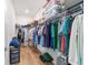 Walk-in closet with organized storage solutions and ample space for clothing and accessories at 8693 Sw 76Th Ln, Ocala, FL 34481