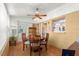 Cozy dining room featuring a classic wooden table set and bright natural light at 8747 Sw 98Th Street Rd # F, Ocala, FL 34481