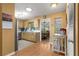 This kitchen is spacious and connects to the dining room, featuring light wood finish at 8747 Sw 98Th Street Rd # F, Ocala, FL 34481