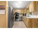 The kitchen has stainless steel appliances and a lot of cabinet space to store essentials at 8747 Sw 98Th Street Rd # F, Ocala, FL 34481