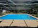 Relax in this screened pool with attached spa and plenty of room for entertaining Gathering and friends at 8951 Sw 202Nd Avenue Rd, Dunnellon, FL 34431