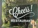 Charming 'Cheers!' Restaurant window display, inviting residents to enjoy nearby dining at 8951 Sw 202Nd Avenue Rd, Dunnellon, FL 34431