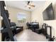 Bedroom with a ceiling fan and space for home office at 9773 Sw 90Th St, Ocala, FL 34481