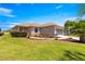 Inviting single-story home featuring a well-maintained lawn and decorative landscaping at 9773 Sw 90Th St, Ocala, FL 34481