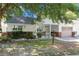 Charming single-story home featuring a well-kept lawn and attached one-car garage on a sunny day at 9855 Sw 85Th Terrace Rd # A, Ocala, FL 34481