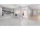 Open floor plan with tile flooring and a modern mural at 9855 Sw 85Th Terrace Rd # A, Ocala, FL 34481