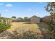 Fenced backyard with a shed and ample space for outdoor activities and gardening at 1114 Hickory Rd, Ocala, FL 34472