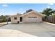 Detached one-car garage with adjacent workspace and ample parking space at 1114 Hickory Rd, Ocala, FL 34472