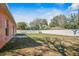 Large fenced backyard with green grass and ample space for outdoor enjoyment at 13425 Sw 106Th Pl, Dunnellon, FL 34432