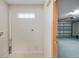 Bright laundry room with tile flooring and space for washer/dryer hookups located off the garage at 13425 Sw 106Th Pl, Dunnellon, FL 34432