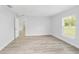 Bright bedroom with neutral decor and sleek flooring at 13505 Sw 112 Pl, Dunnellon, FL 34432