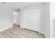 Bedroom featuring wood-look floors and closet at 13505 Sw 112 Pl, Dunnellon, FL 34432