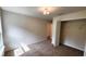 Neutral bedroom with closet, carpet, and natural light at 15407 Sw 59Th Avenue Rd, Ocala, FL 34473