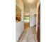 Inviting entryway showcasing wood-look floors and views into the living area at 15407 Sw 59Th Avenue Rd, Ocala, FL 34473