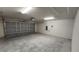 Spacious two-car garage with concrete flooring and an automatic garage door opener at 15407 Sw 59Th Avenue Rd, Ocala, FL 34473