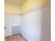 Walk-in closet featuring shelving and light-colored walls and floors at 1598 Sw 152Nd Ct, Ocala, FL 34481