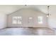 Bright living area with lots of natural light, new flooring, and vaulted ceilings at 1610 Sw 152Nd Ct, Ocala, FL 34481