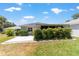 Enjoy the open backyard and nearby nature on the concrete patio of this single-Gathering home at 17505 Se 100Th Ct, Summerfield, FL 34491