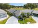 Attractive single-story home with manicured landscaping and an attached two-car garage at 17505 Se 100Th Ct, Summerfield, FL 34491