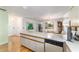 Kitchen with large island and view to dining area at 17505 Se 100Th Ct, Summerfield, FL 34491