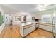 Open floor plan from kitchen to living area and dining area at 17505 Se 100Th Ct, Summerfield, FL 34491